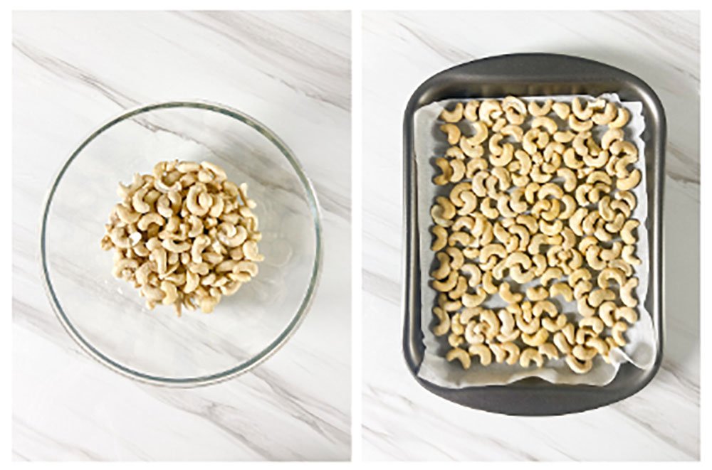 Visão das castanhas de caju cruas sendo temperados com óleo de coco e sal e já na forma forrada com papel manteiga